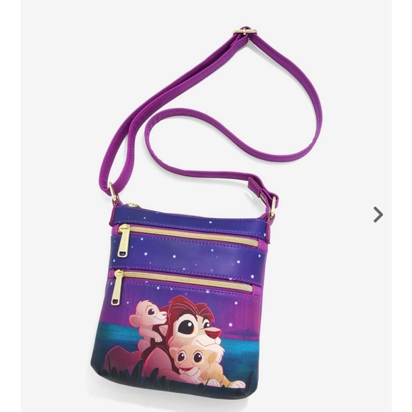 Loungefly Handbags - LOUNGEFLY DISNEY lion king family purple crossbody bag
